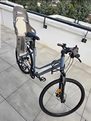 Vélo Riverside 26 pouces 21 vitesses avec siège enfant, très bon état
