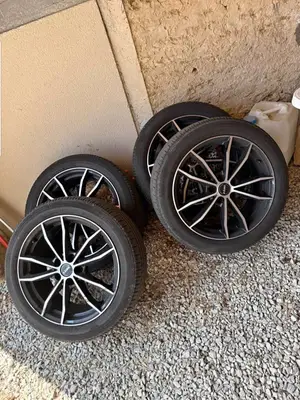 Jantes 18 pouces Volkswagen / Audi avec pneus 215/50/18 en bon état - Miniature 2
