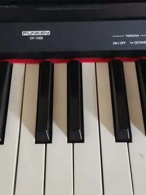 Piano électronique en bon état