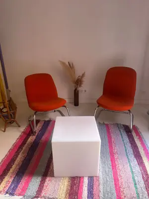 Paire de fauteuils orange vintage