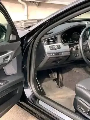 BMW Série 7 740d 3.0 xDrive de 2015, couleur verte - Miniature 5