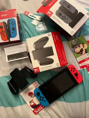 Nintendo Switch OLED blanche en excellent état avec boîte d'origine
