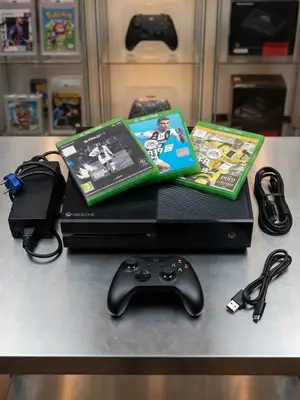 Xbox One 320 Go avec une manette et FIFA