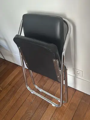 Chaise pliante HJH OFFICE ESTO 706300 noire en simili-cuir, très bon état