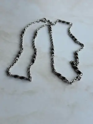 Collier argent pendentif trèfle noir élégant