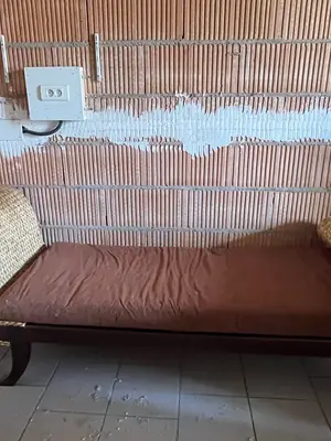 Méridienne bois et rotin tressé avec coussin