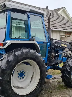 Tracteur Ford 6610 avec chargeur frontal Trima 1320, lame et chaînes arrière - Miniature 3
