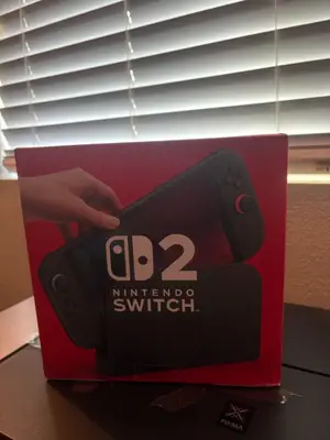 Nintendo Switch 2 couleurs noir en parfait état - Miniature 4