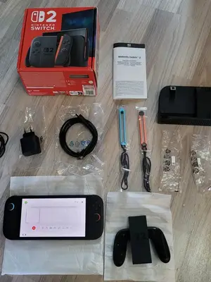 Nintendo Switch 2 couleurs noir en parfait état - Miniature 2