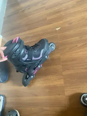 Rollers Oxelo femme noir et rose pointure 40 en très bon état