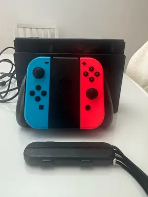 Nintendo Switch avec manette sans fil et jeu Mario