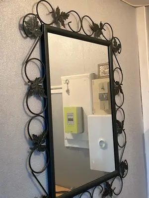 Miroir cadre métal motif feuille d'arbre