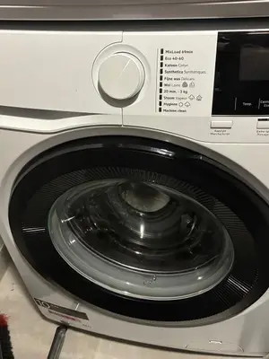Lave-linge AEG série 7000 ProSteam