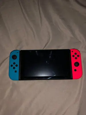 Nintendo Switch OLED blanche en bon état avec Joy-Con, dock et boîte - Miniature 5