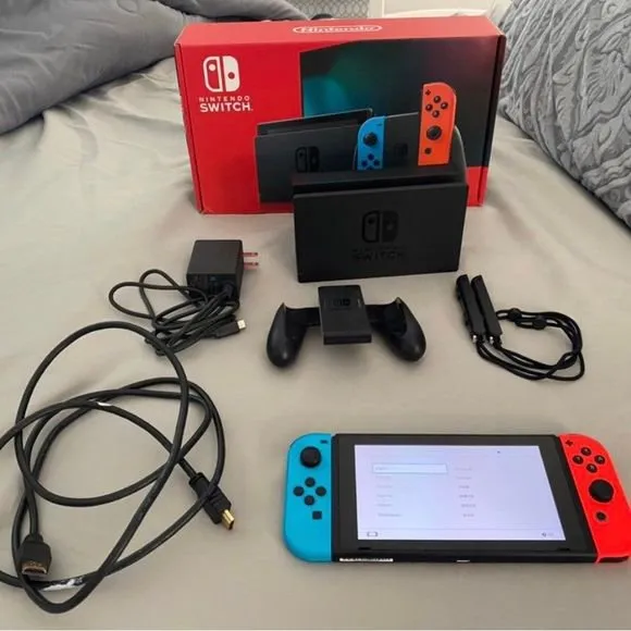Nintendo Switch OLED blanche en bon état avec Joy-Con, dock et boîte - Photo 1