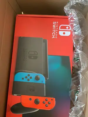 Nintendo Switch OLED blanche en bon état avec Joy-Con, dock et boîte - Miniature 4