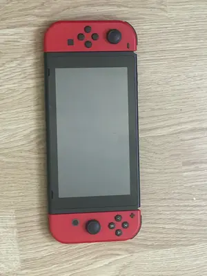 Nintendo Switch en parfait état, sans dommage, avec housse offerte - Miniature 3