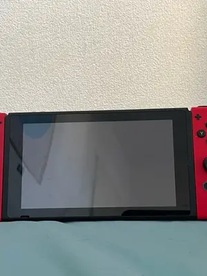 Nintendo Switch en parfait état, sans dommage, avec housse offerte
