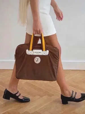 Sac Lancel Roland-Garros 2022 en toile, porte-documents aux détails en cuir