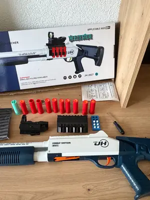 Jouet fusil très bon état avec munitions et boîte