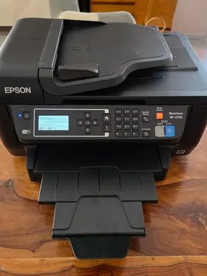 Imprimante Epson WorkForce WF-2750. Fonctionne très bien et en très bonne état. Il faut simplement r