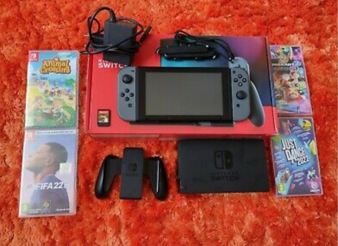 Nintendo switch + 5 jeux. Matche parfaitement quelques rayures a l'arrière  mais rien de méchant ! - Miniature 2
