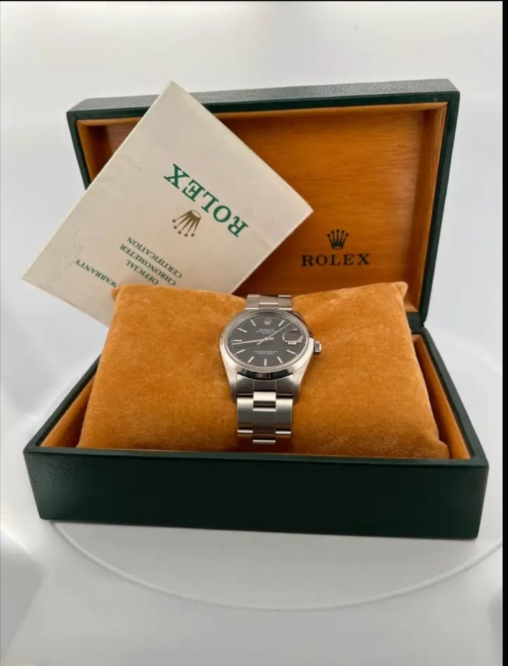 rolex date 15200 cadran noir bracelet oyster 34 mm.