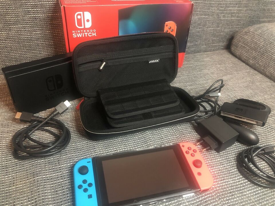 Nintendo Switch V2 avec 2 jeux et accessoires d'occasion - PS - Miniature 2