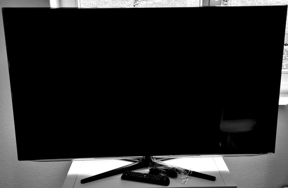 TV Samsung 55" avec télécommande et nouveau câble