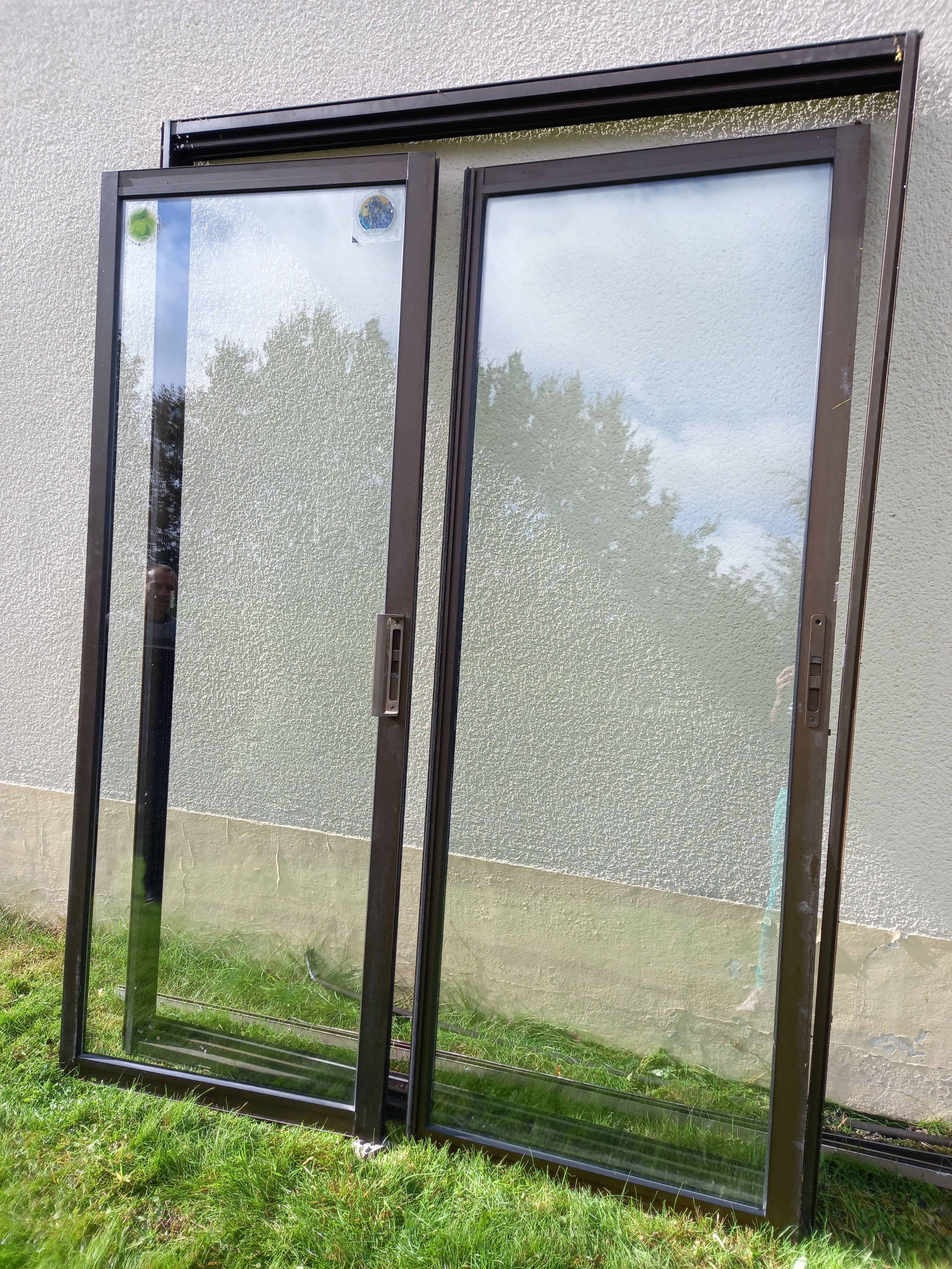 Baie vitrée coulissante : 150€
