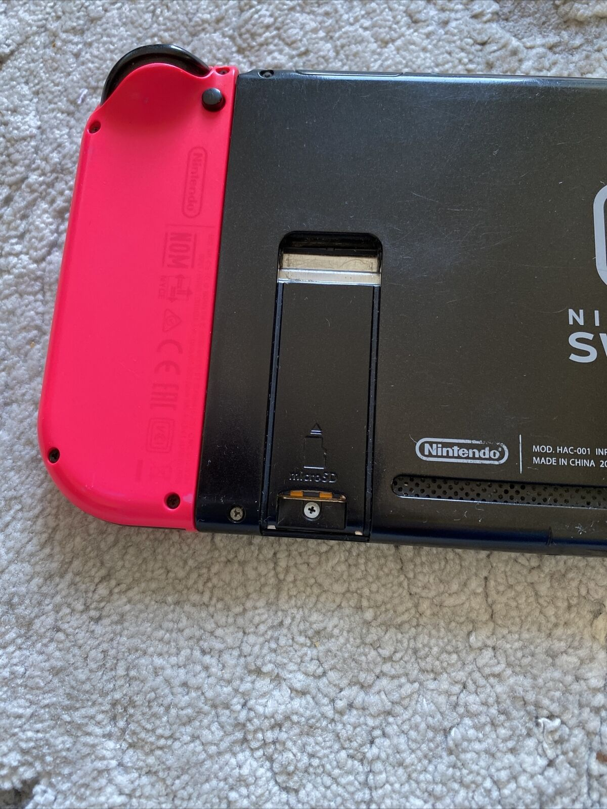 Console Nintendo Switch avec Joy-Con-Neon-Grün/Neon-Pink avec 1 Spiel Super Smash