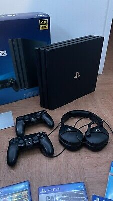Sony PlayStation 4 Pro 1To Très bon état, 8 Jeux + 2 Manettes