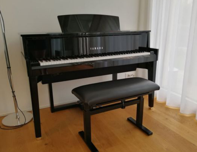 Piano Yamaha très neuf sans aucun problème