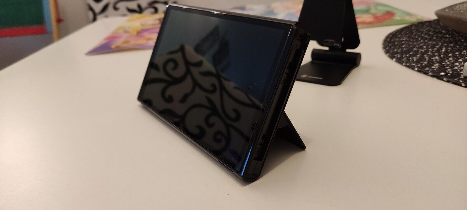 Tablette Nintendo Switch OLED comme neuve en excellent état