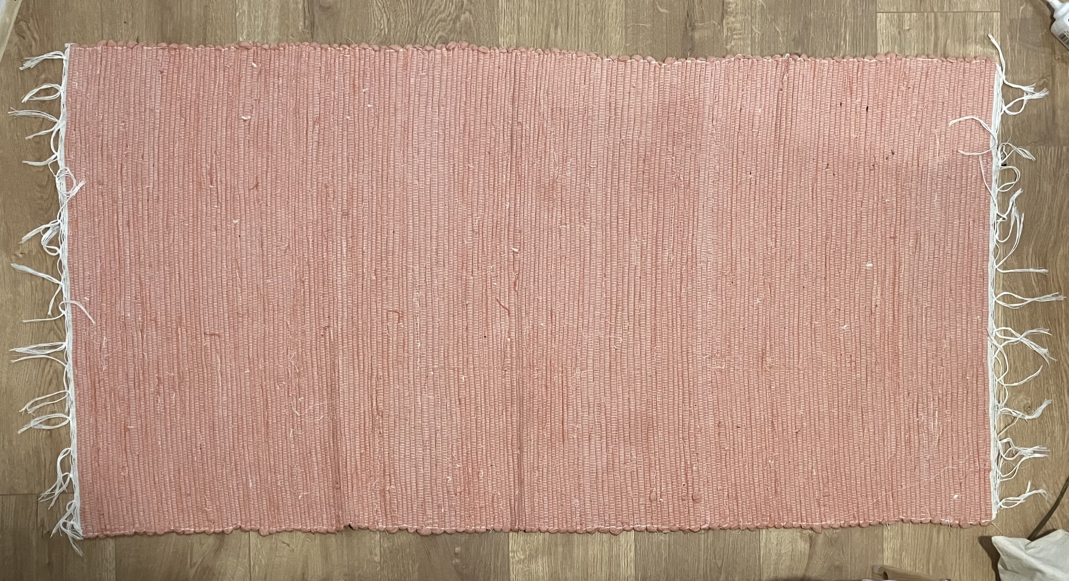 Tapis rose artisanal