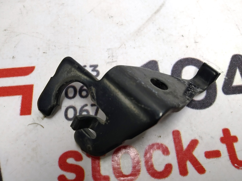 Support de montage de flexible de frein avant gauche (sur fourche de support) {MSR_MX}  1038627-00-A