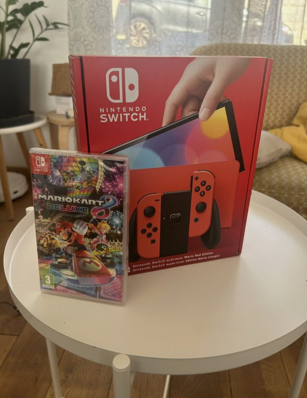 nitendo switch Oled Mario (rouge) Avec Mario Kart 8