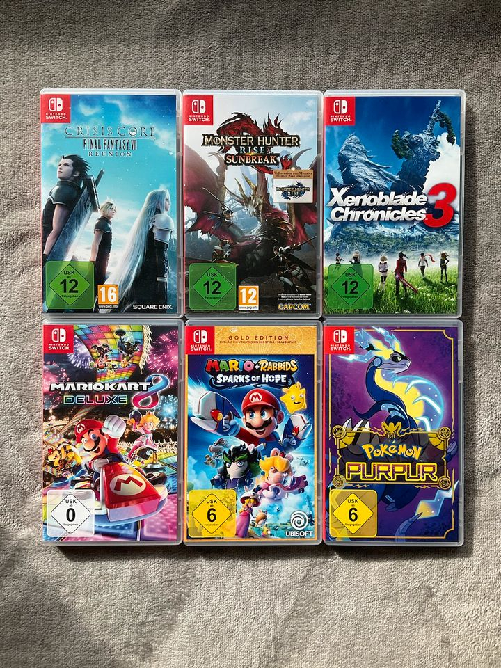 Nintendo Switch OLED Édition Splatoon 3 + 8 jeux Switch