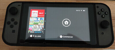 Nintendo Switch 32 Go + 128Go Console Grises avec accessoires