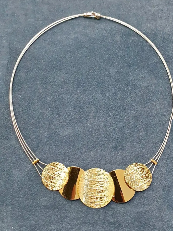 Collier en or jaune et blanc a vendre