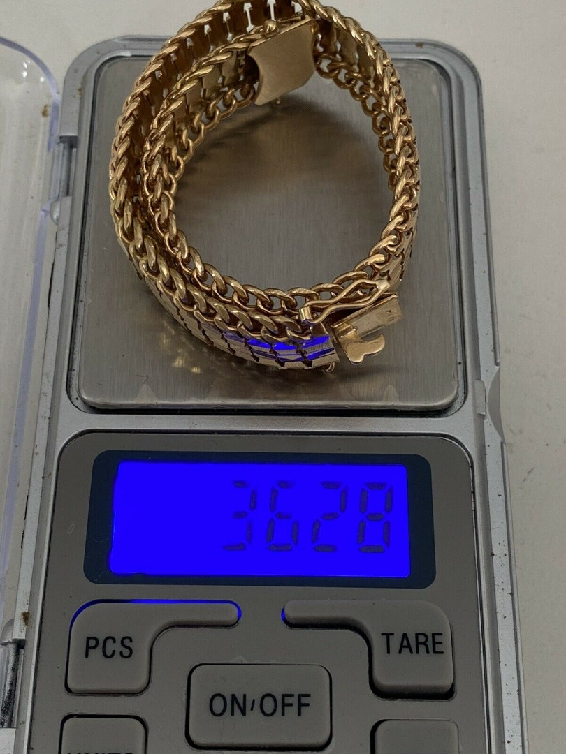 Bracelet en Or jaune 18 carats 750 millième poinçon tête d'aigle