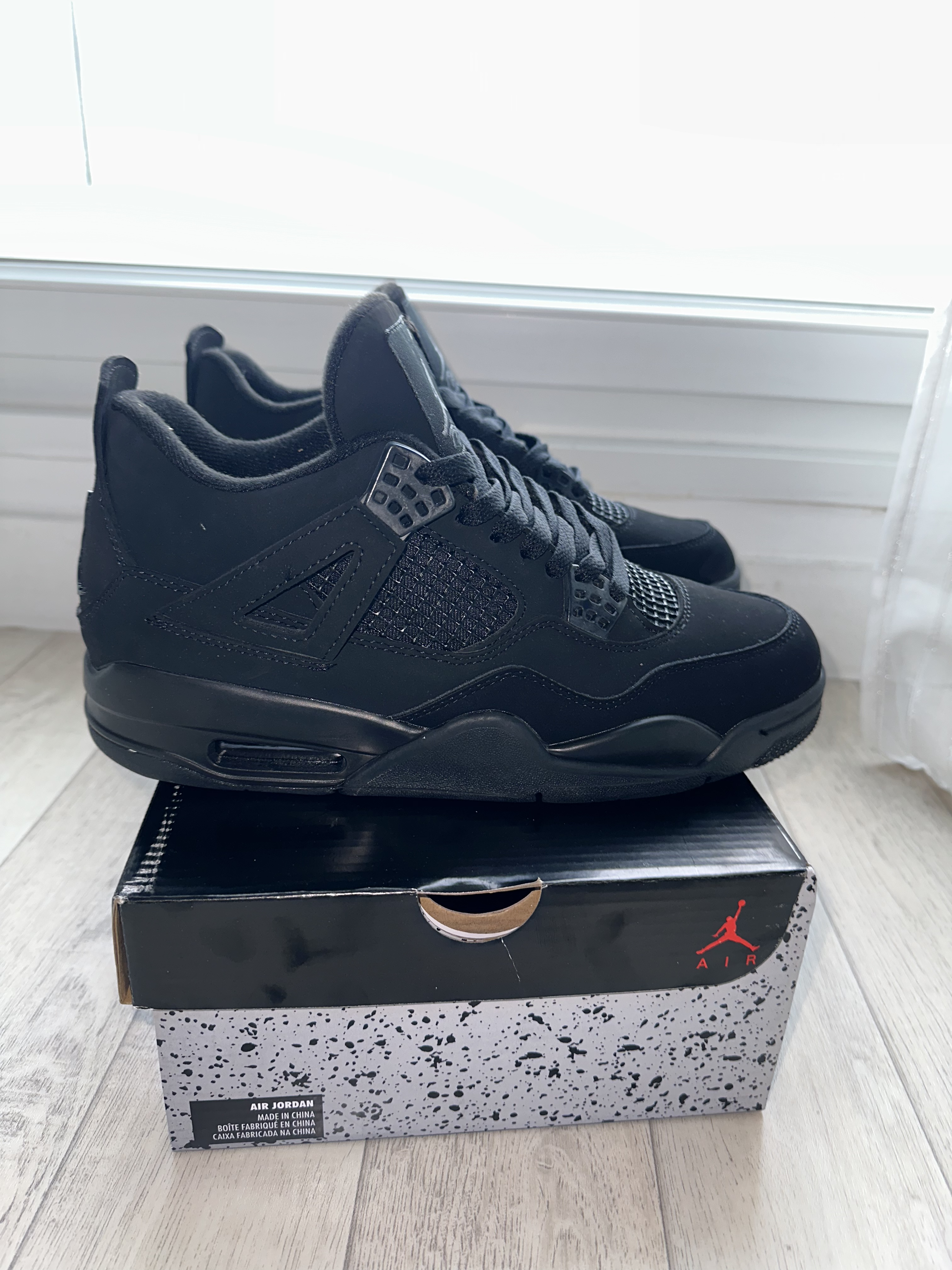 Jordan 4 black cat