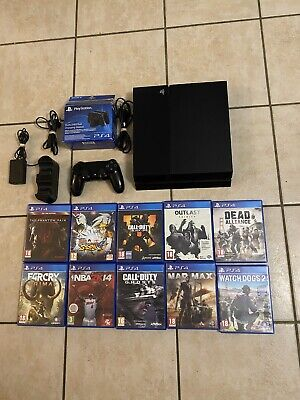 console ps4 fat 500 go plus 10 jeux +1 manette et station de recharge ps4 la console à une petite fi