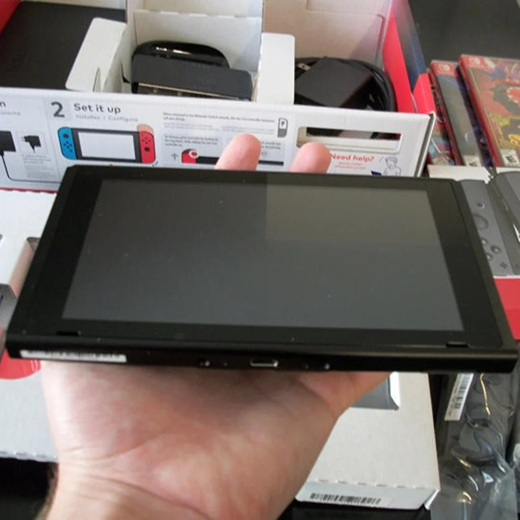 Nintendo Switch V2 avec jeux et accessoires